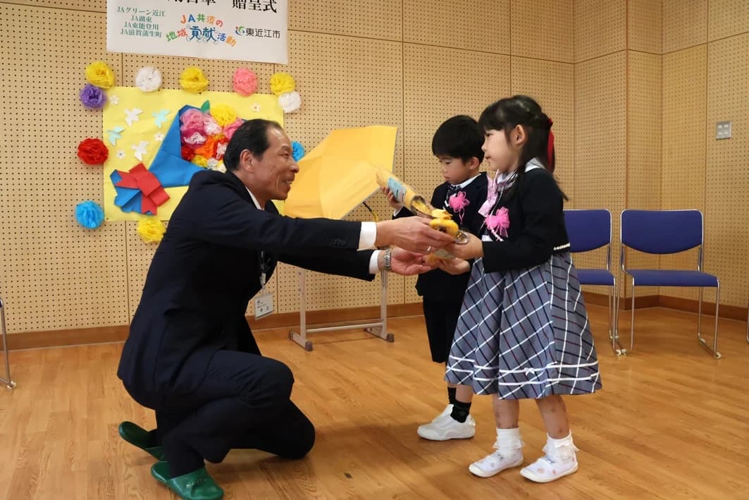 市内4つのJAより通学用日傘840本を寄贈